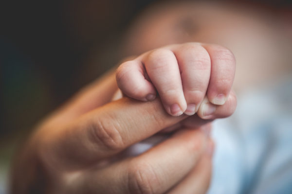 Newborn Baby Holding Mothers Hand 504858712 4256x2832 1